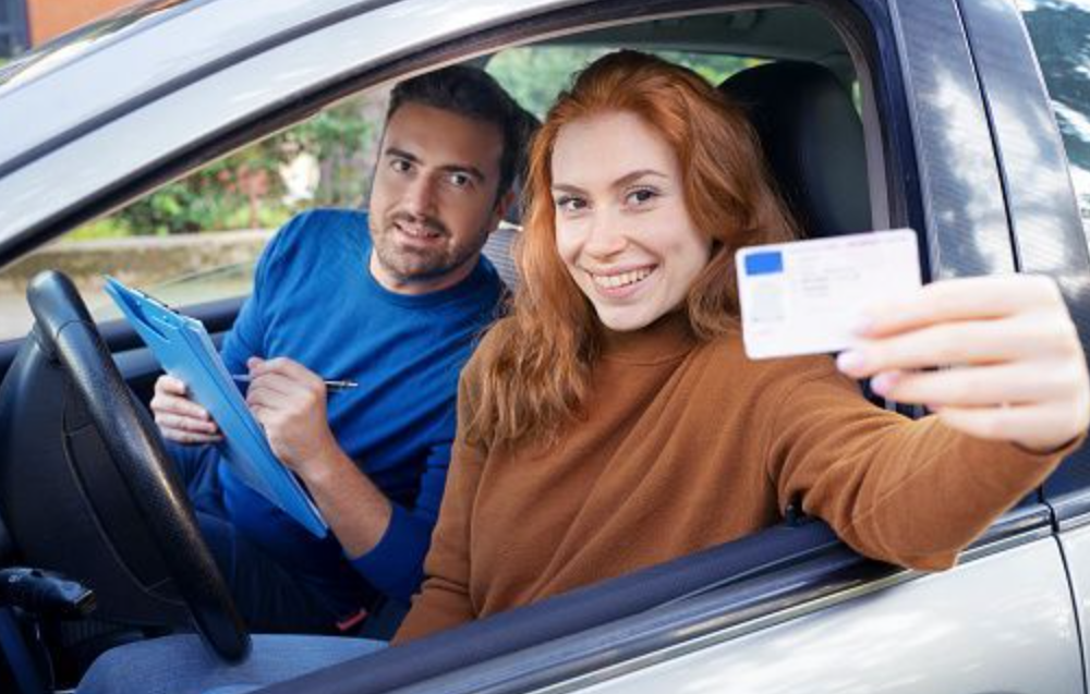 A person successfully holding their driver license netherlands